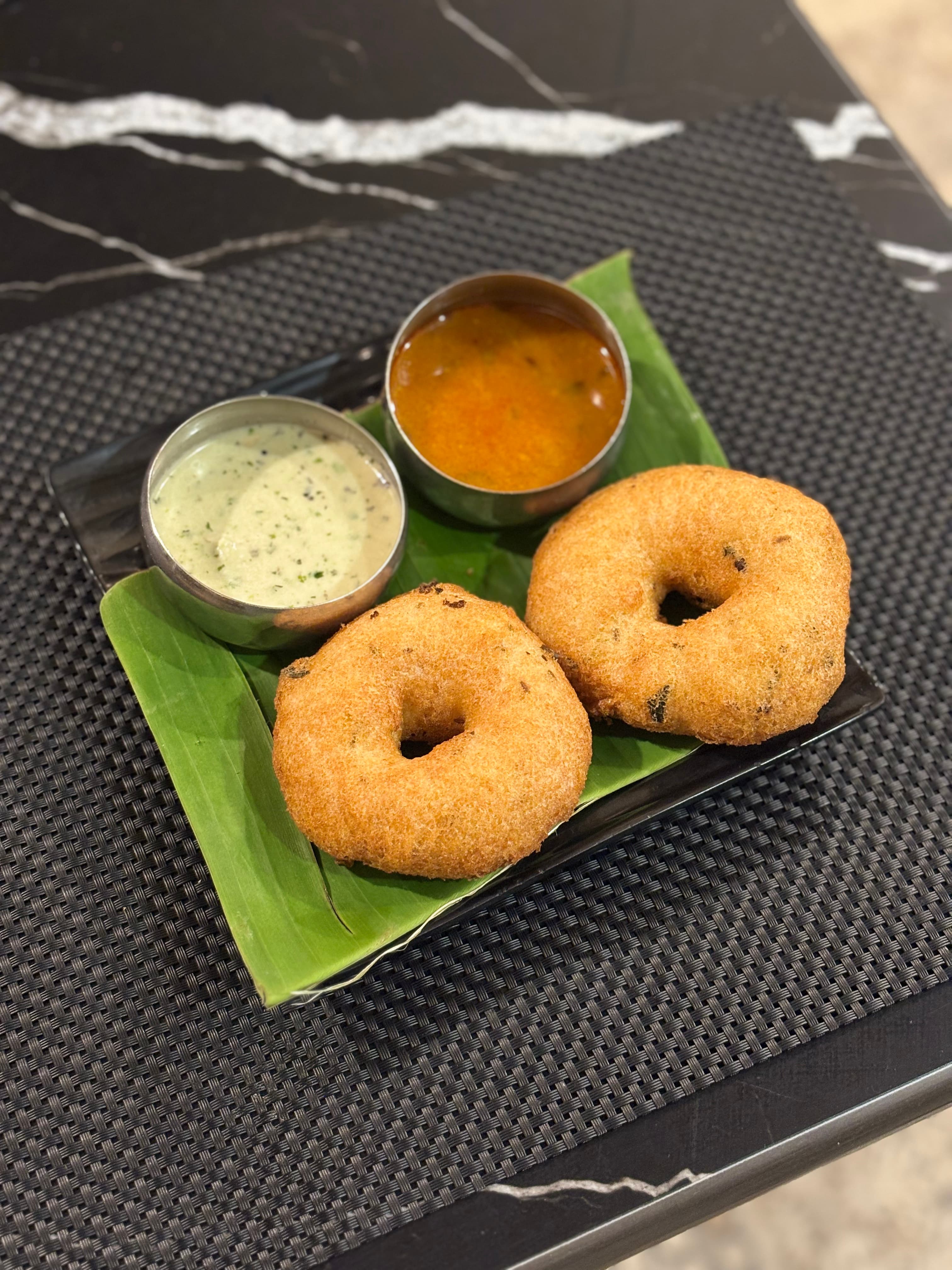 Crispy medu vada with coconut chutney and sambar