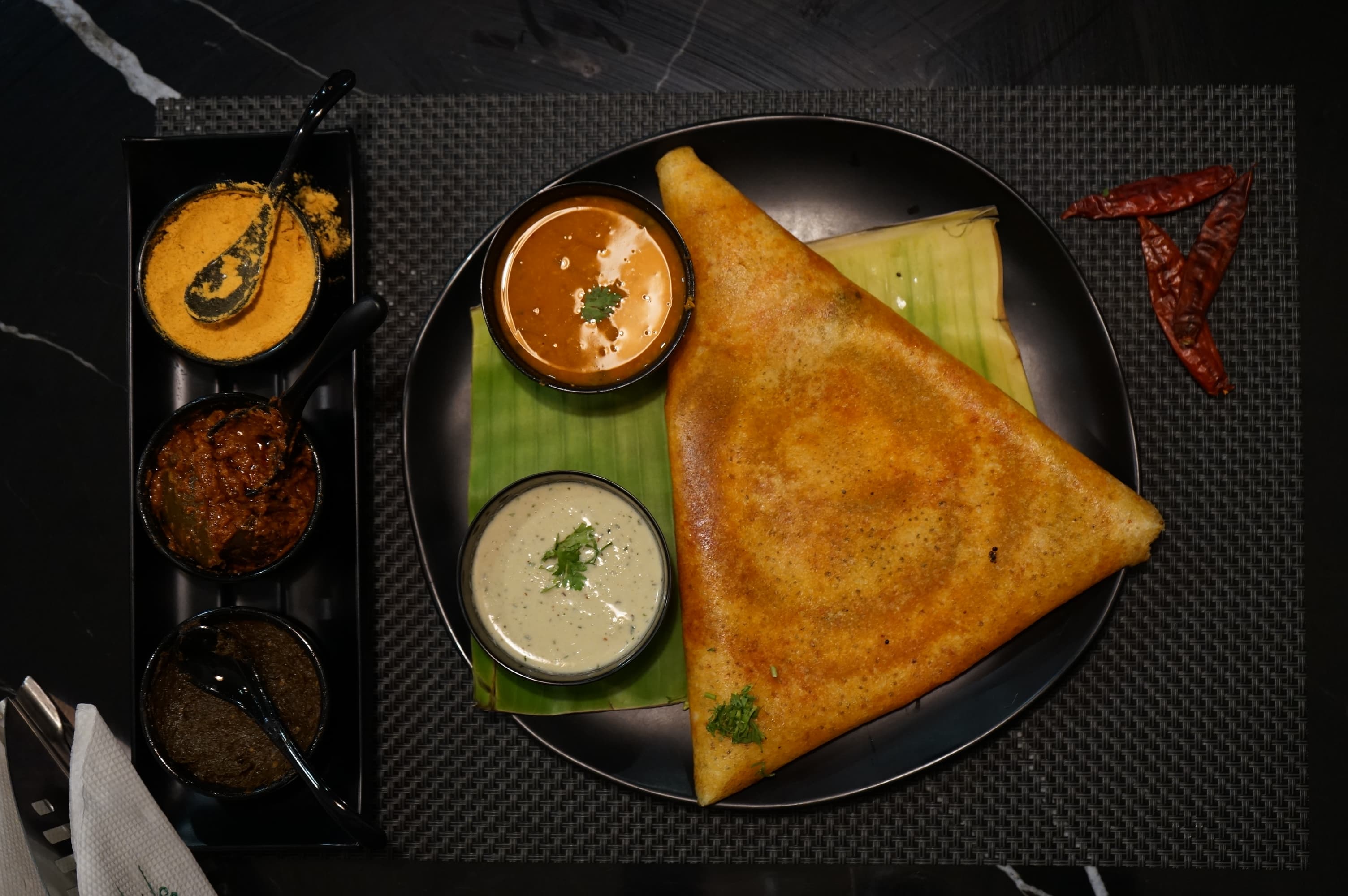 Crisp Mysore masala dosa served with sambar and chutneys